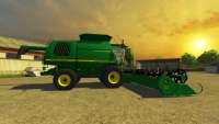 Зелёный комбайн на игровом скриншоте Farming Simulator 2013