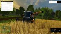 Скриншот уборочного комбайна из Farming Simulator 2015